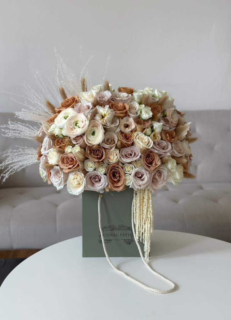 Earthy flowers such as brown roses, ivory roses, dried flowers and more.