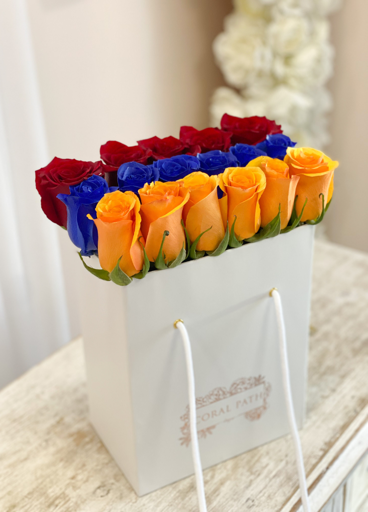 Armenian flag color roses. Red blue orange roses in a box.
