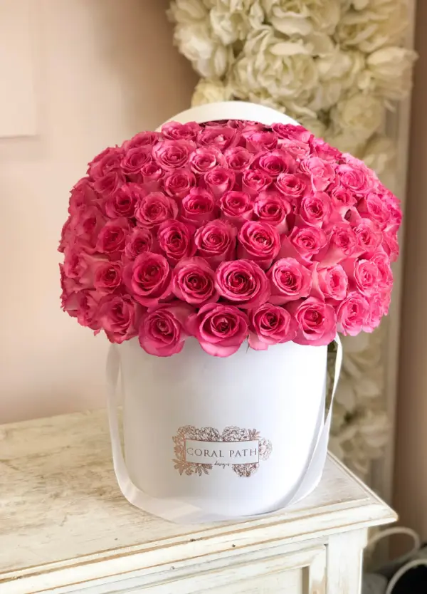 Experience the beauty of uniquely named and colored roses, blending pink and creamy hues to evoke happiness and admiration for any occasion.