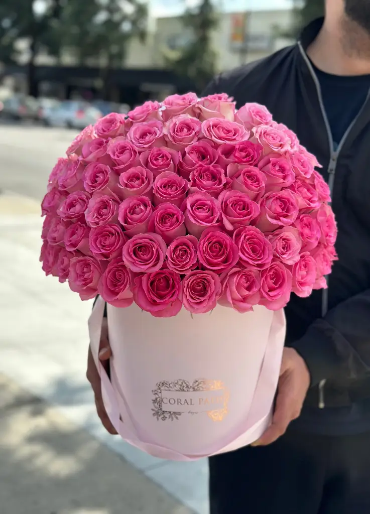 Experience the beauty of uniquely named and colored roses, blending pink and creamy hues to evoke happiness and admiration for any occasion.