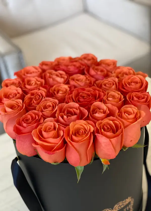 Orange roses in a hat box