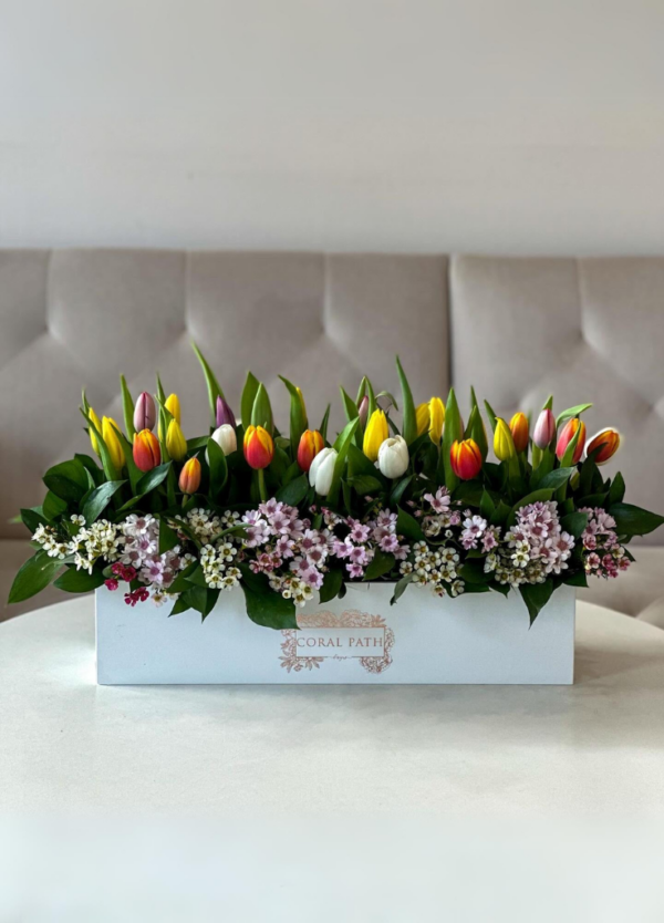 Tulip arrangement in a long box