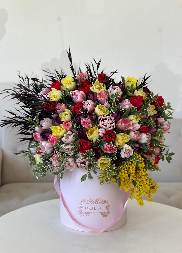 Tulips, Ivy and Mimosa flowers in a hat box