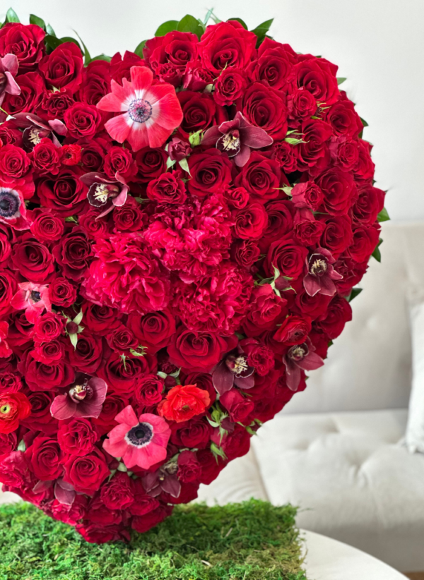 Floral heart frame with roses and mixed flowers