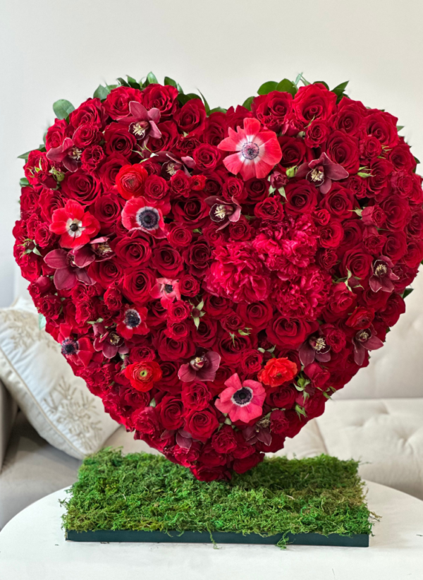 Floral heart frame with roses and mixed flowers