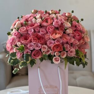 coral flowers in a signature box, flower delivery