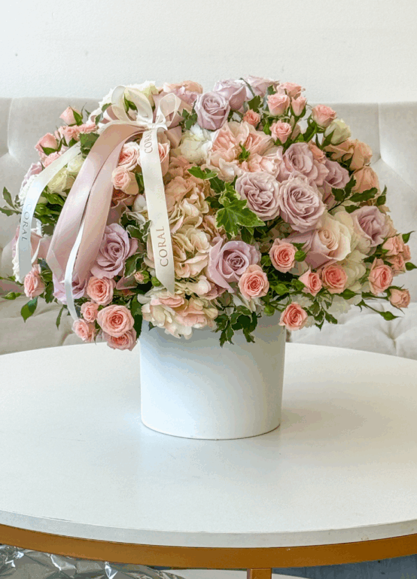 pastel flowers in a white vase