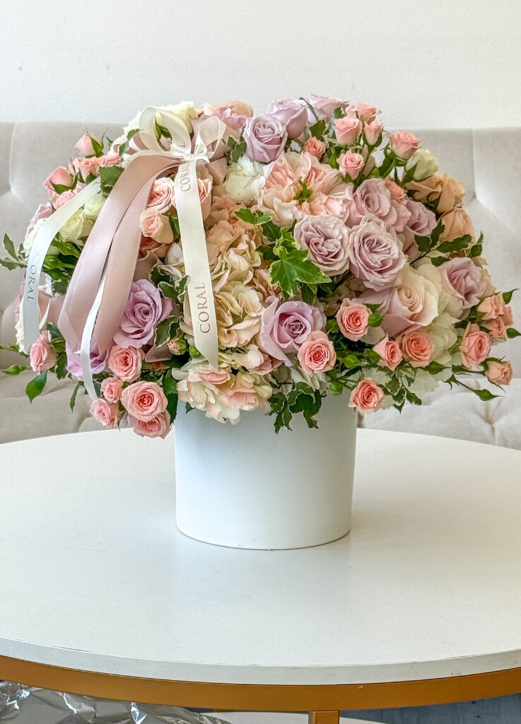 pastel flowers in a white vase